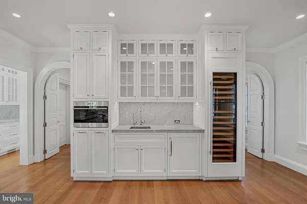 a view of room with wooden floor and window