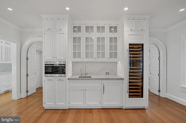a view of room with wooden floor and window