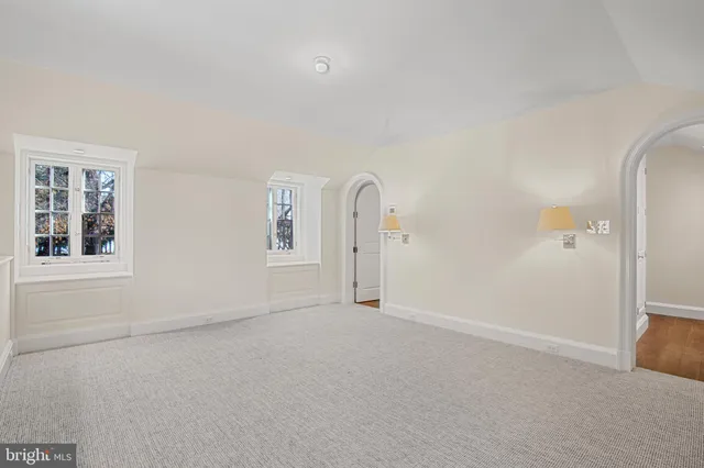 a view of a lake with a building in the background