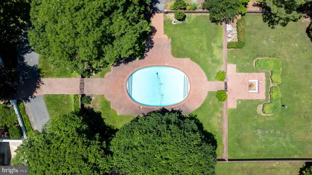 a living room with fireplace furniture and a flat screen tv
