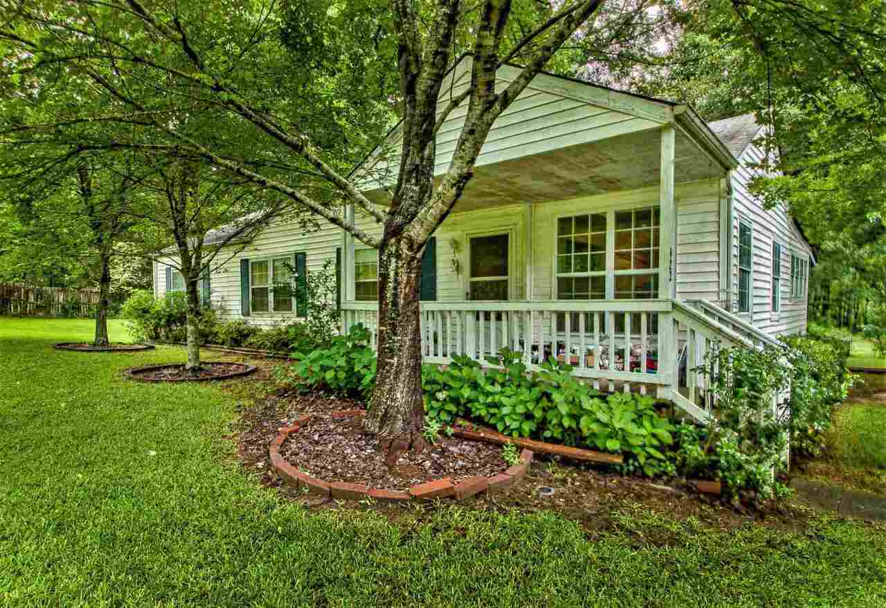422 Joe Stephens Road Newnan, GA 30263 - Photo 1 of 1 a view of a house with a yard and potted plants