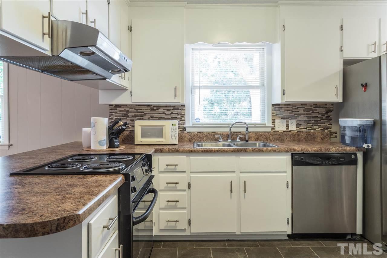 1004 Aversboro Road Garner, NC 27529 - Photo 13 of 29 Overhead vents for comfortable cooking.
