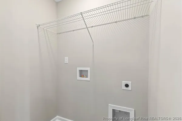 a bathroom with a sink and vanity