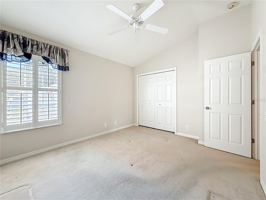 3589 Country Pointe Place Palm Harbor, FL 34684 - Photo 20 of 31 a view of an empty room with a window