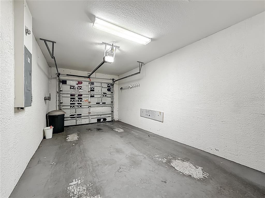 3589 Country Pointe Place Palm Harbor, FL 34684 - Photo 24 of 31 a view of a room with a garage