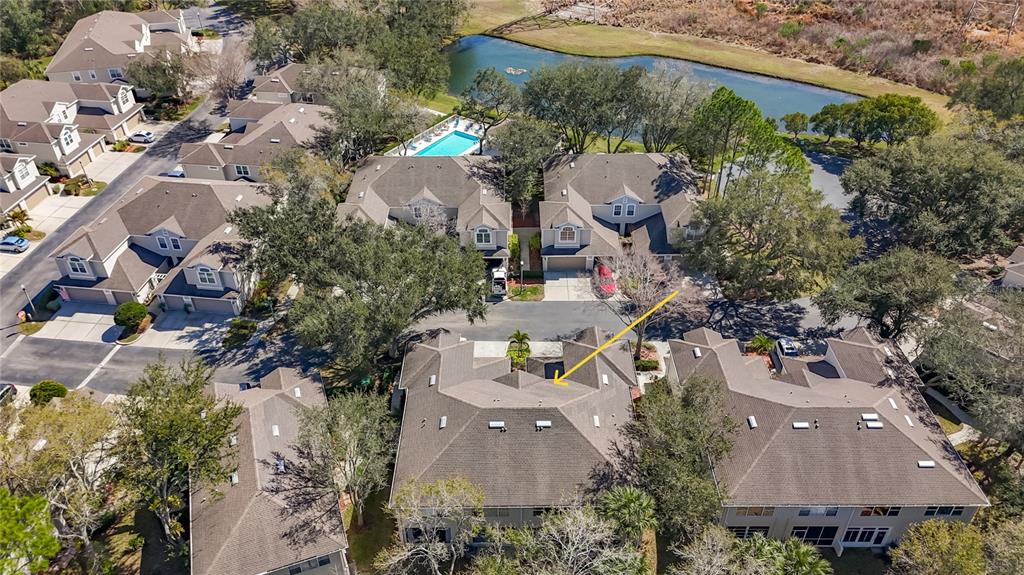 3589 Country Pointe Place Palm Harbor, FL 34684 - Photo 27 of 31 an aerial view of multiple houses with yard