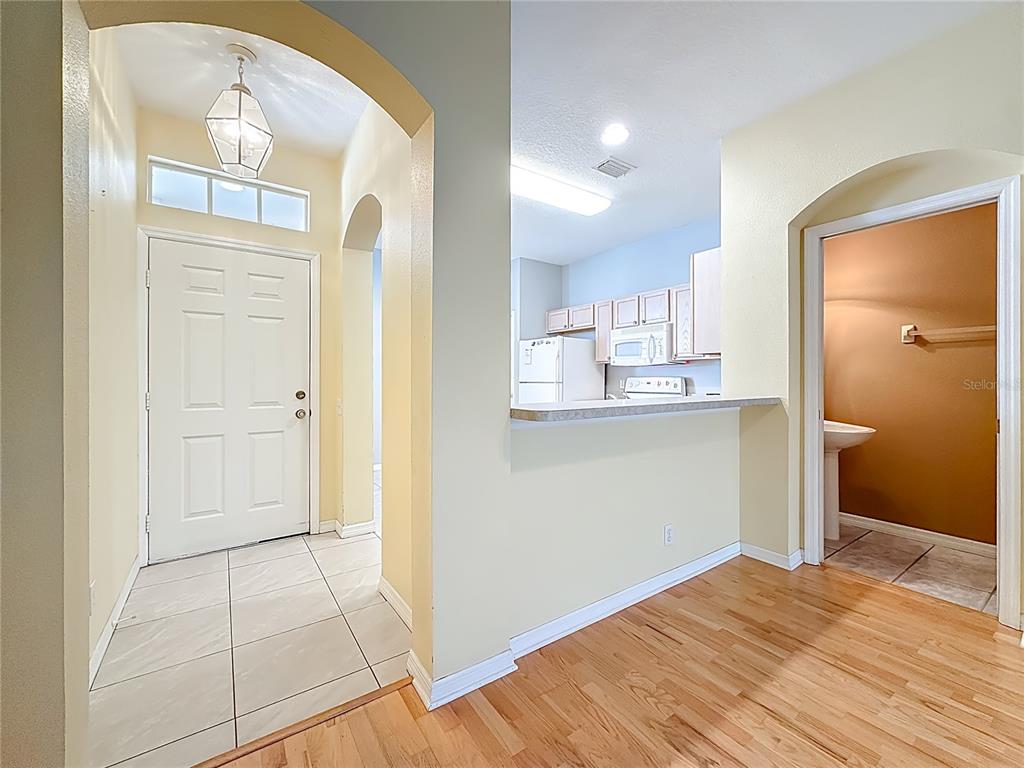3589 Country Pointe Place Palm Harbor, FL 34684 - Photo 4 of 31 a view of kitchen with wooden floor
