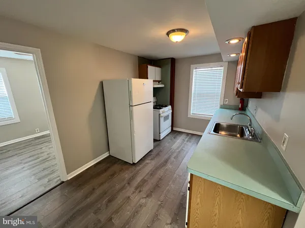 a bathroom with a sink and toilet