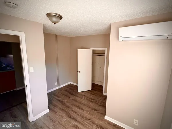 a kitchen with stainless steel appliances granite countertop a stove and a refrigerator