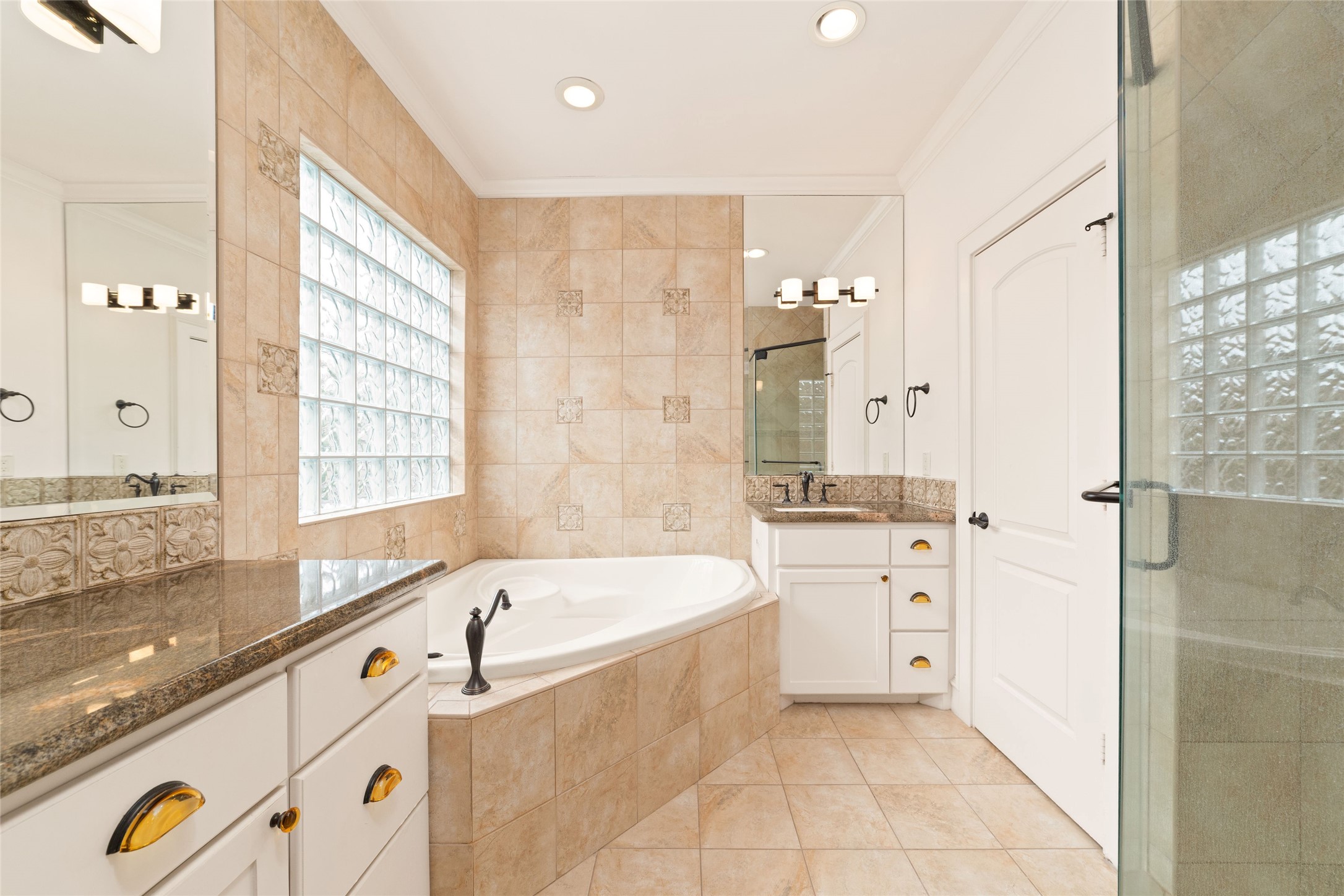 4102 Gramercy Street Houston, TX 77025 - Photo 30 of 35 a bathroom with a bathtub and a sink