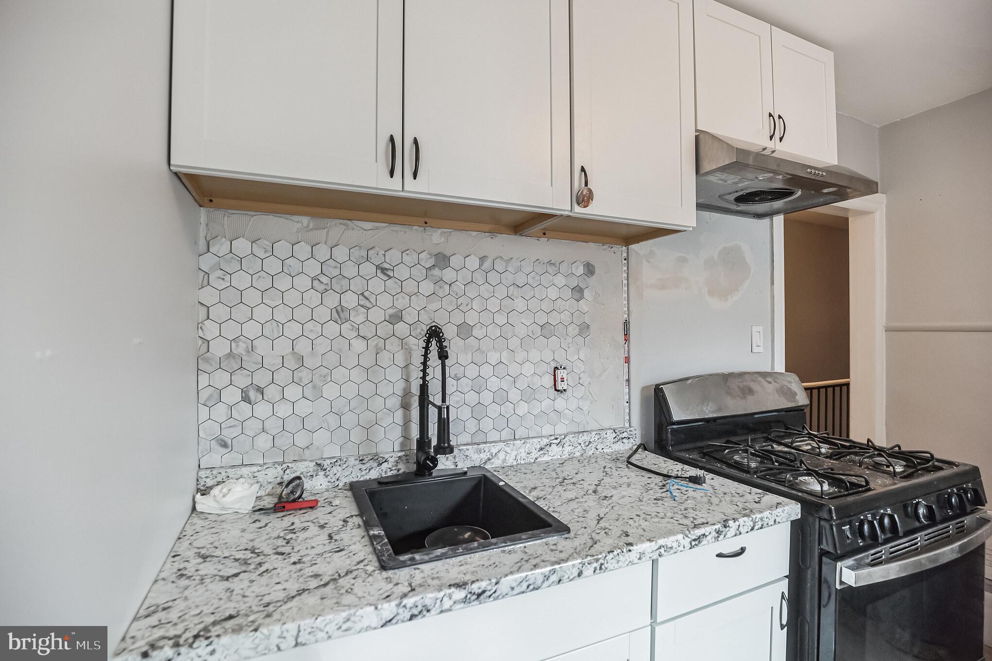 207 MacDade Boulevard Collingdale, PA 19023 - Photo 25 of 30 New kitchen was being installed during shoot.