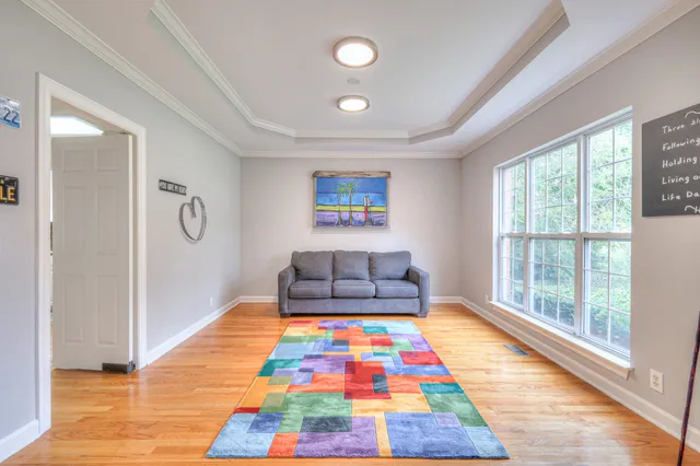 a bathroom with a toilet a sink and a mirror