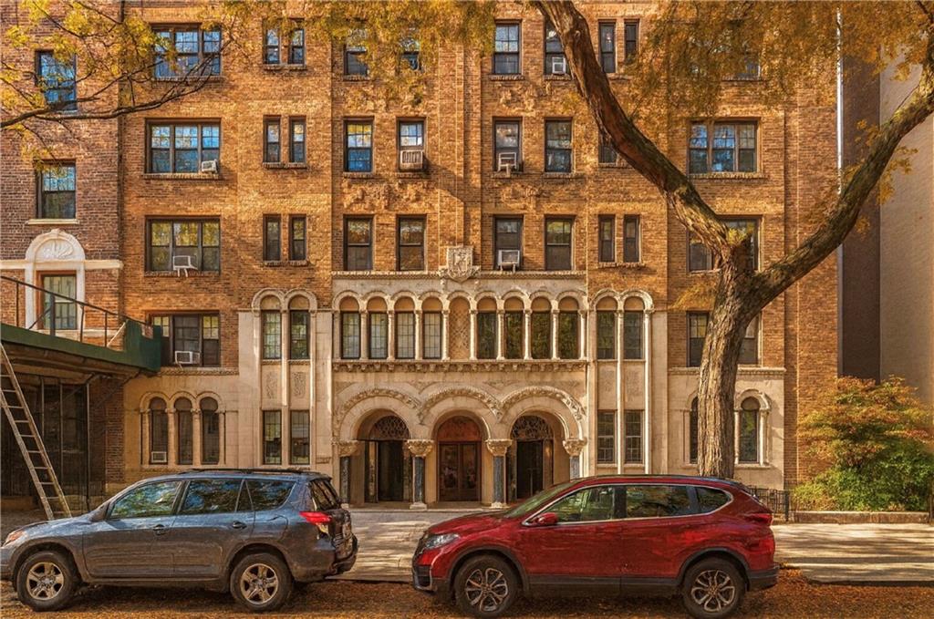 70 Remsen Street, Unit 4F Brooklyn, NY 11201 - Photo 1 of 11 a front view of a residential apartment building with parking space