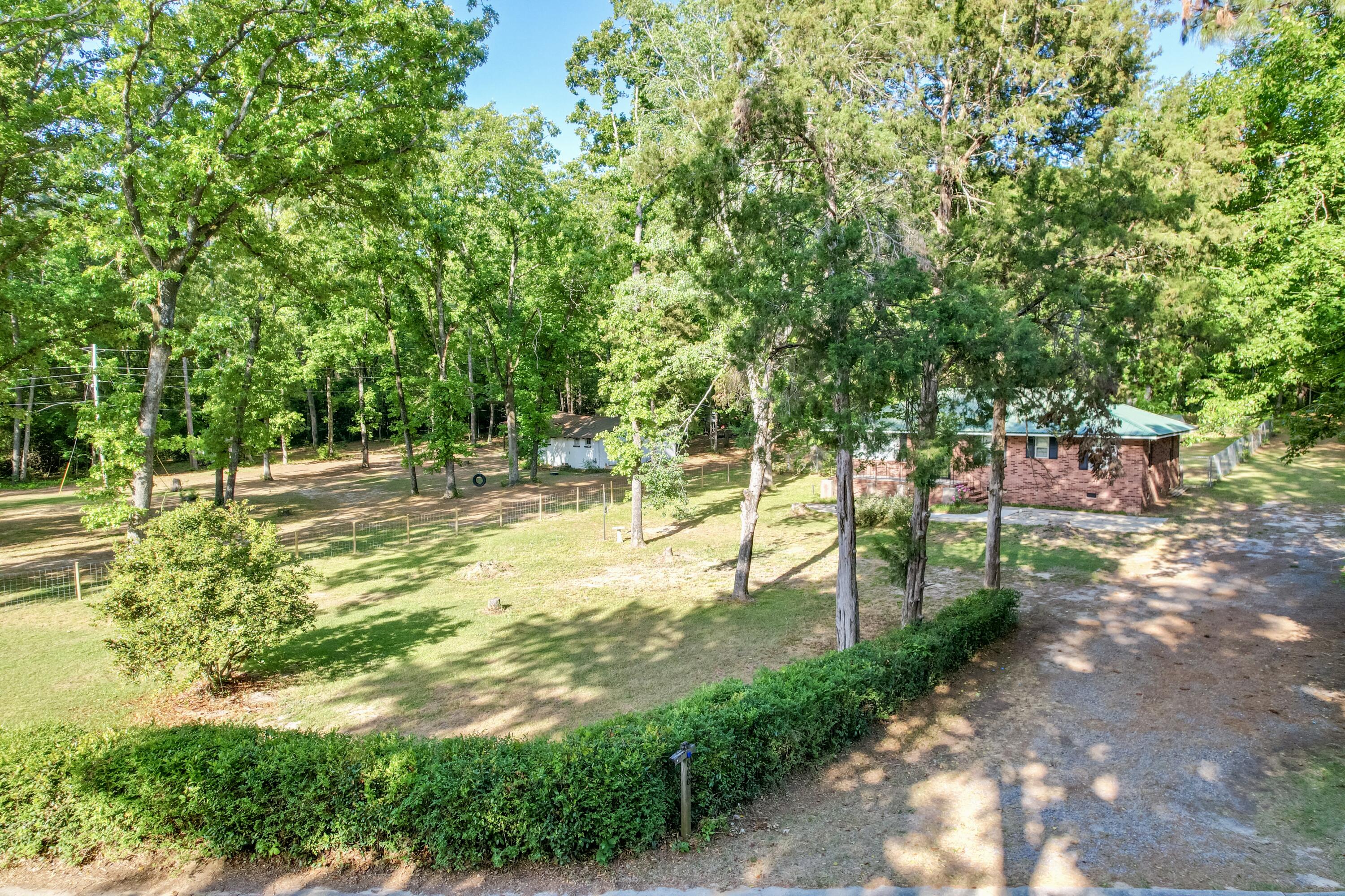 800 Old Whiskey Road South New Ellenton, SC 29809 - Photo 26 of 31 a swimming pool with trees in the background