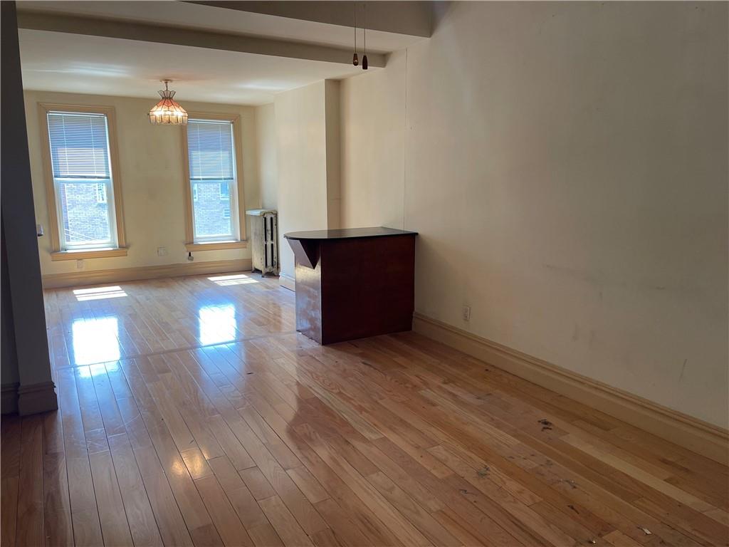 46 A Windsor Place Brooklyn, NY 11215 - Photo 2 of 24 a view of empty room with wooden floor