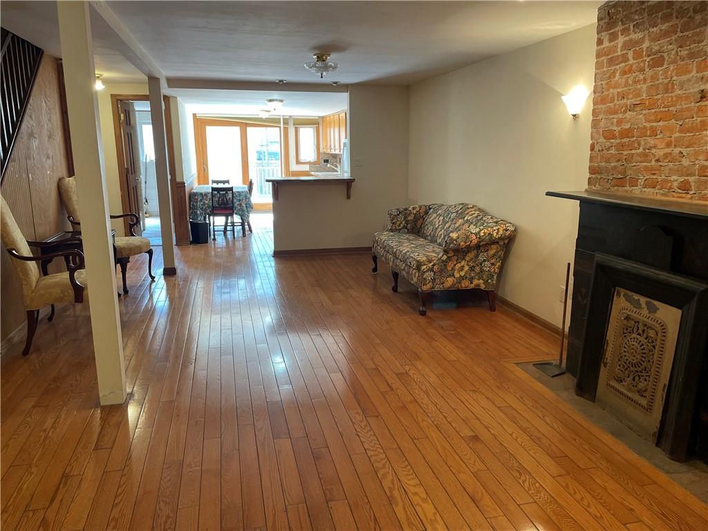 46 A Windsor Place Brooklyn, NY 11215 - Photo 21 of 24 a living room with furniture and a fireplace