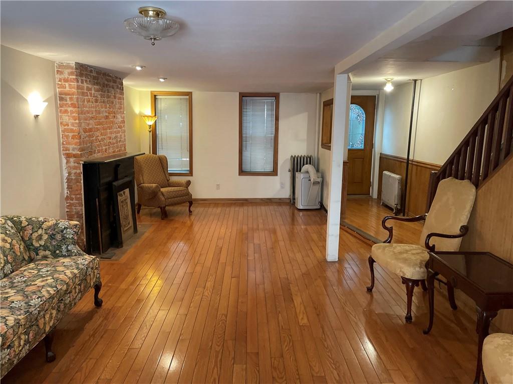 46 A Windsor Place Brooklyn, NY 11215 - Photo 23 of 24 a view of a livingroom with furniture and hardwood floor