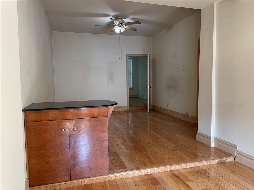 46 A Windsor Place Brooklyn, NY 11215 - Photo 3 of 24 an empty room with wooden floor
