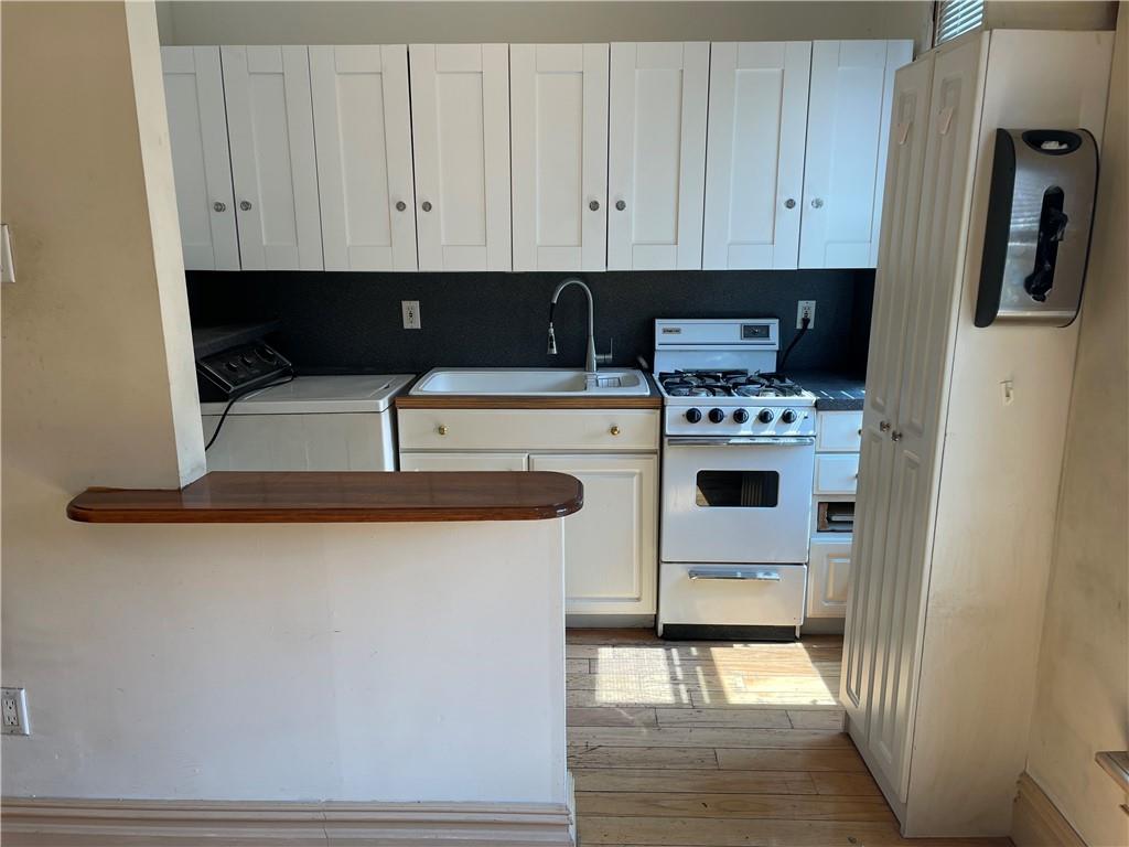 46 A Windsor Place Brooklyn, NY 11215 - Photo 4 of 24 a view of kitchen with stainless steel appliances granite countertop a stove a refrigerator and a cabinets