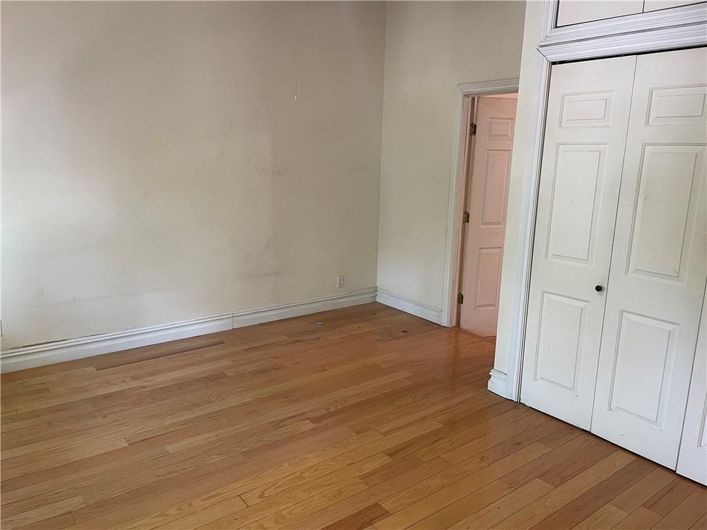 46 A Windsor Place Brooklyn, NY 11215 - Photo 9 of 24 a view of an empty room with wooden floor