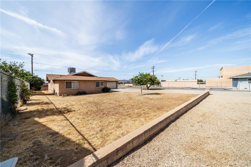 6331 Pedley Road Jurupa Valley, CA 92509 - Photo 20 of 45 a view of a swimming pool with an outdoor space