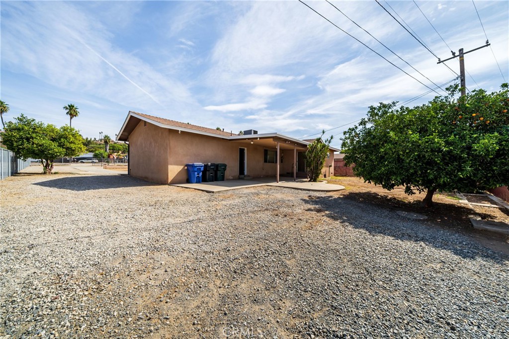 6331 Pedley Road Jurupa Valley, CA 92509 - Photo 24 of 45 a view of a house with a yard and garage