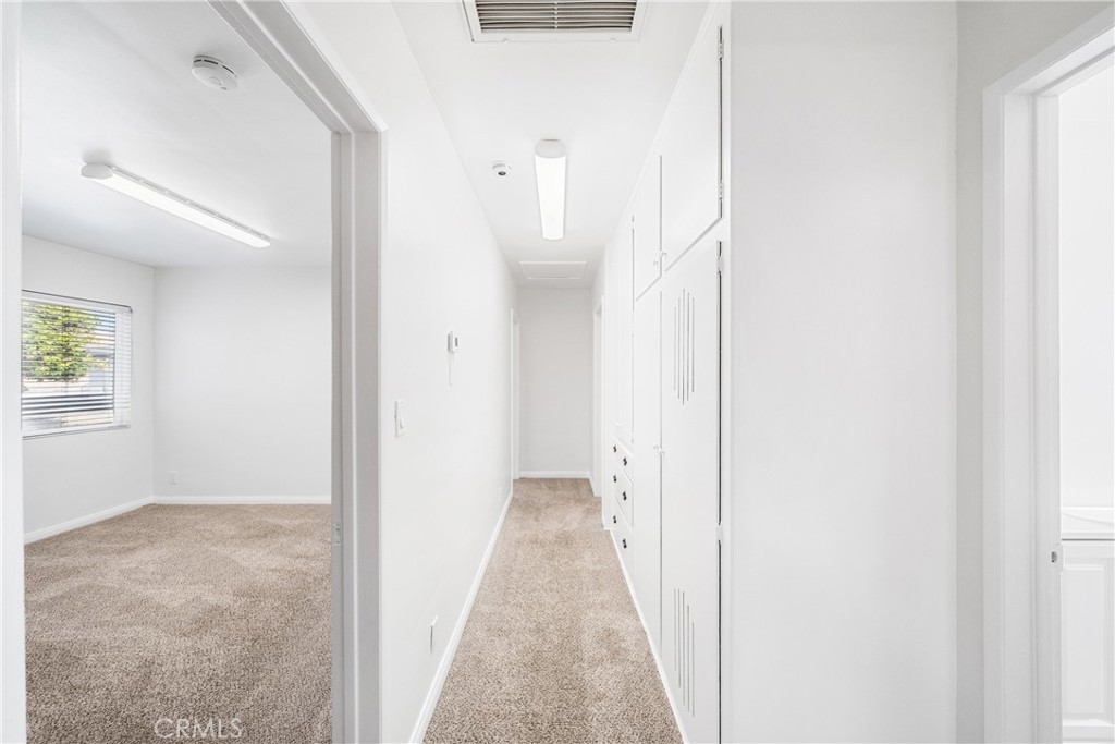 6331 Pedley Road Jurupa Valley, CA 92509 - Photo 39 of 45 a view of a hallway with white walls