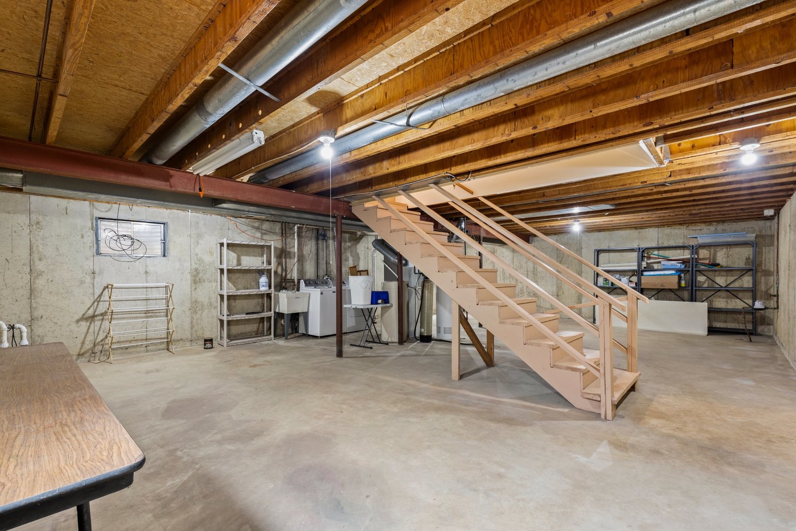 134 Meadows Drive Sugar Grove, IL 60554 - Photo 16 of 20 a view of an empty room with wooden ceiling