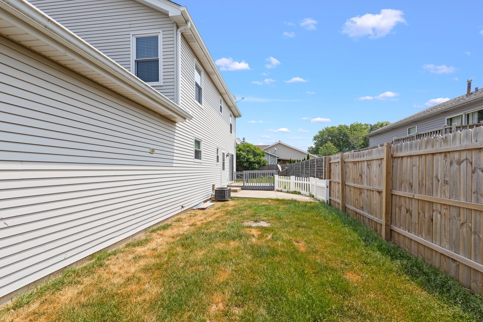 134 Meadows Drive Sugar Grove, IL 60554 - Photo 17 of 20 a view of backyard with small cabin