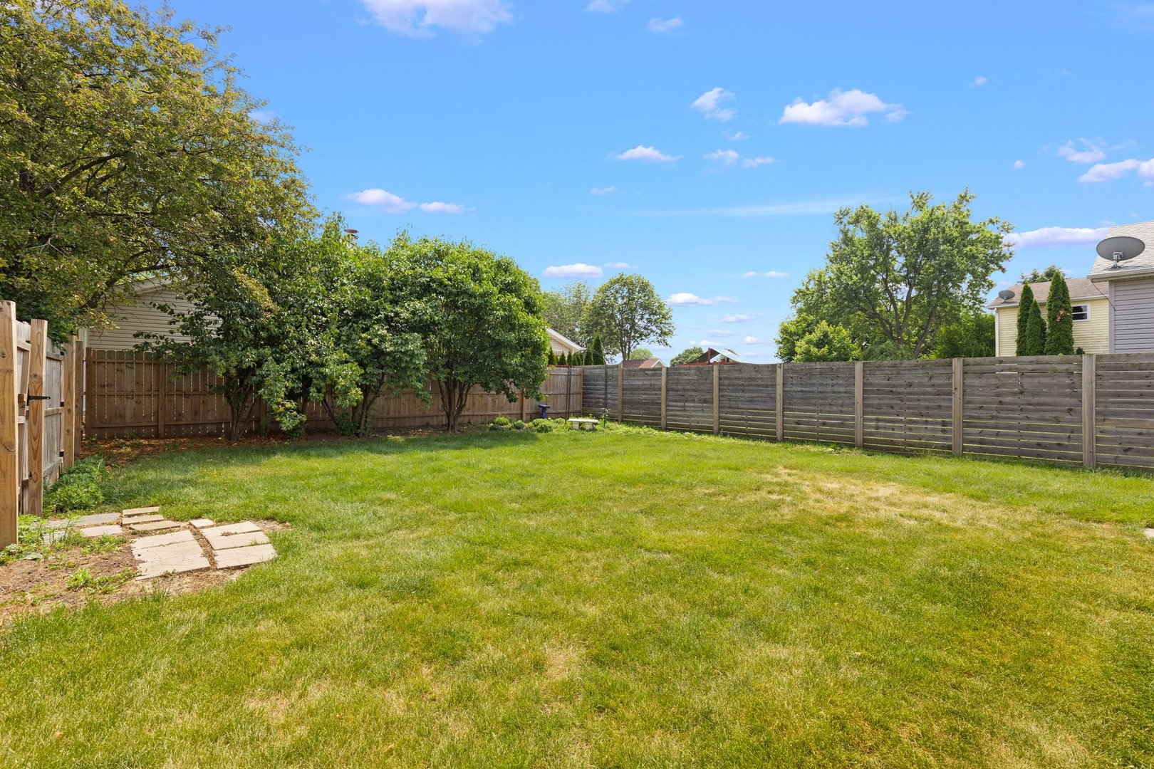 134 Meadows Drive Sugar Grove, IL 60554 - Photo 18 of 20 a view of a yard with a tree