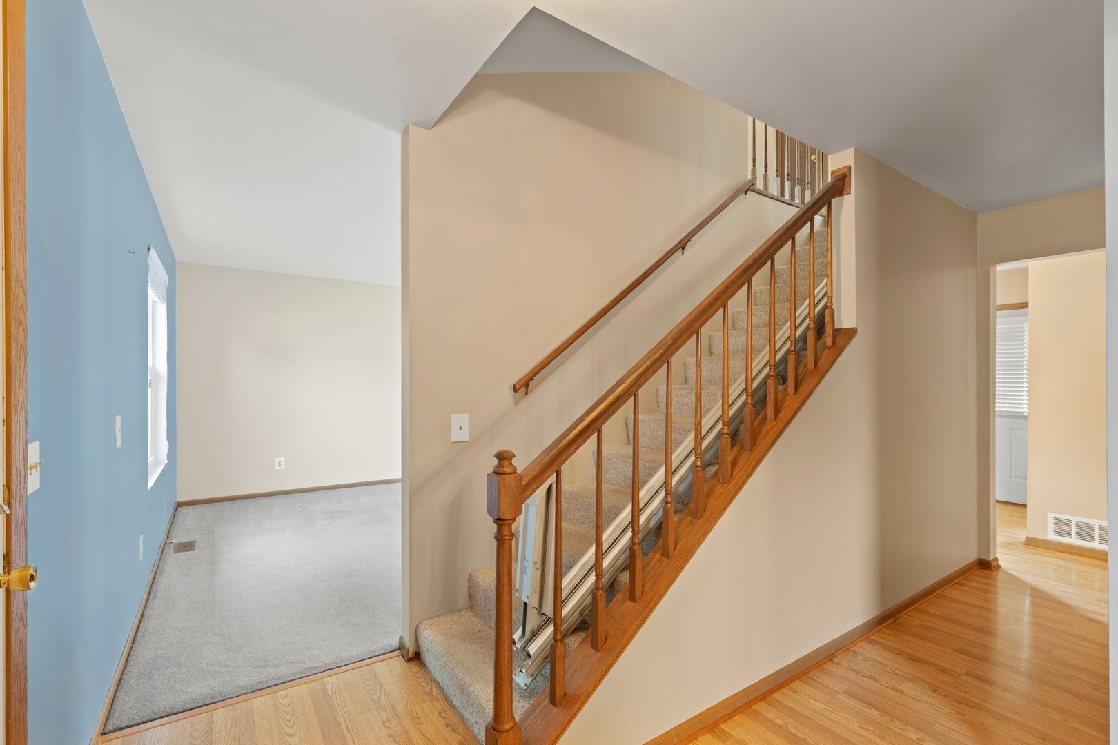 134 Meadows Drive Sugar Grove, IL 60554 - Photo 2 of 20 a view of an entryway with wooden floor
