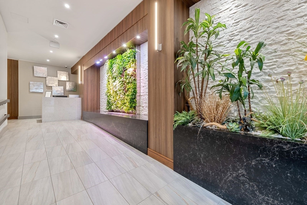 121 Portland Street, Unit 605 Boston, MA 02114 - Photo 15 of 19 a view of entryway with wooden floor