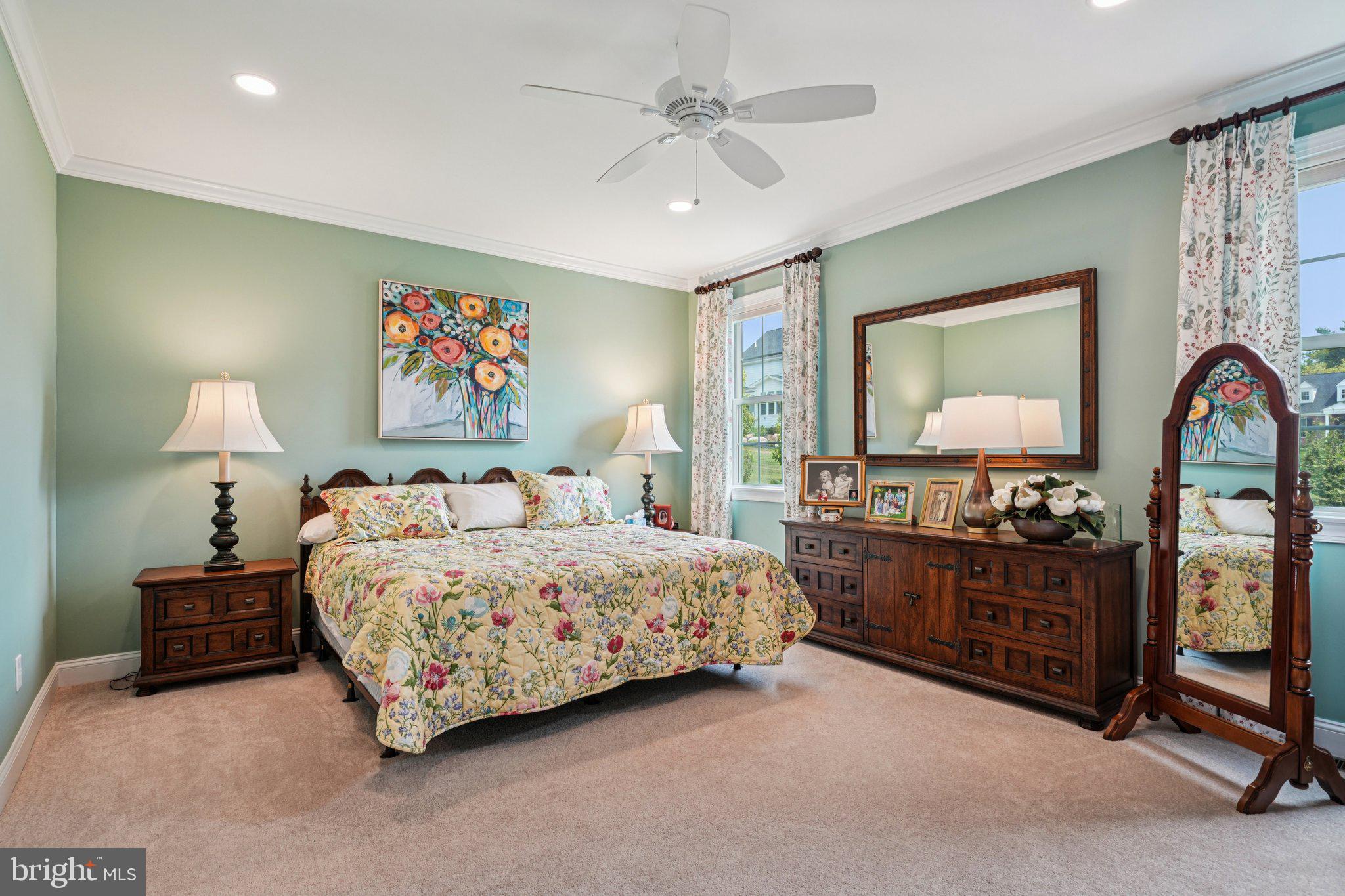 4459 Old Saucon Road Bethlehem, PA 18015 - Photo 15 of 40 a bedroom with a bed and a chandelier