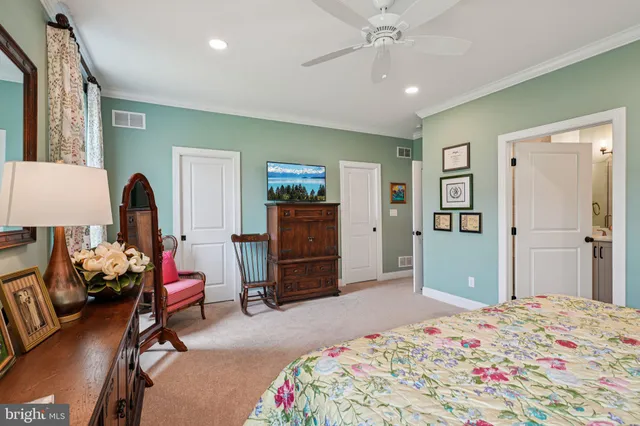 a bedroom with a bed and furniture