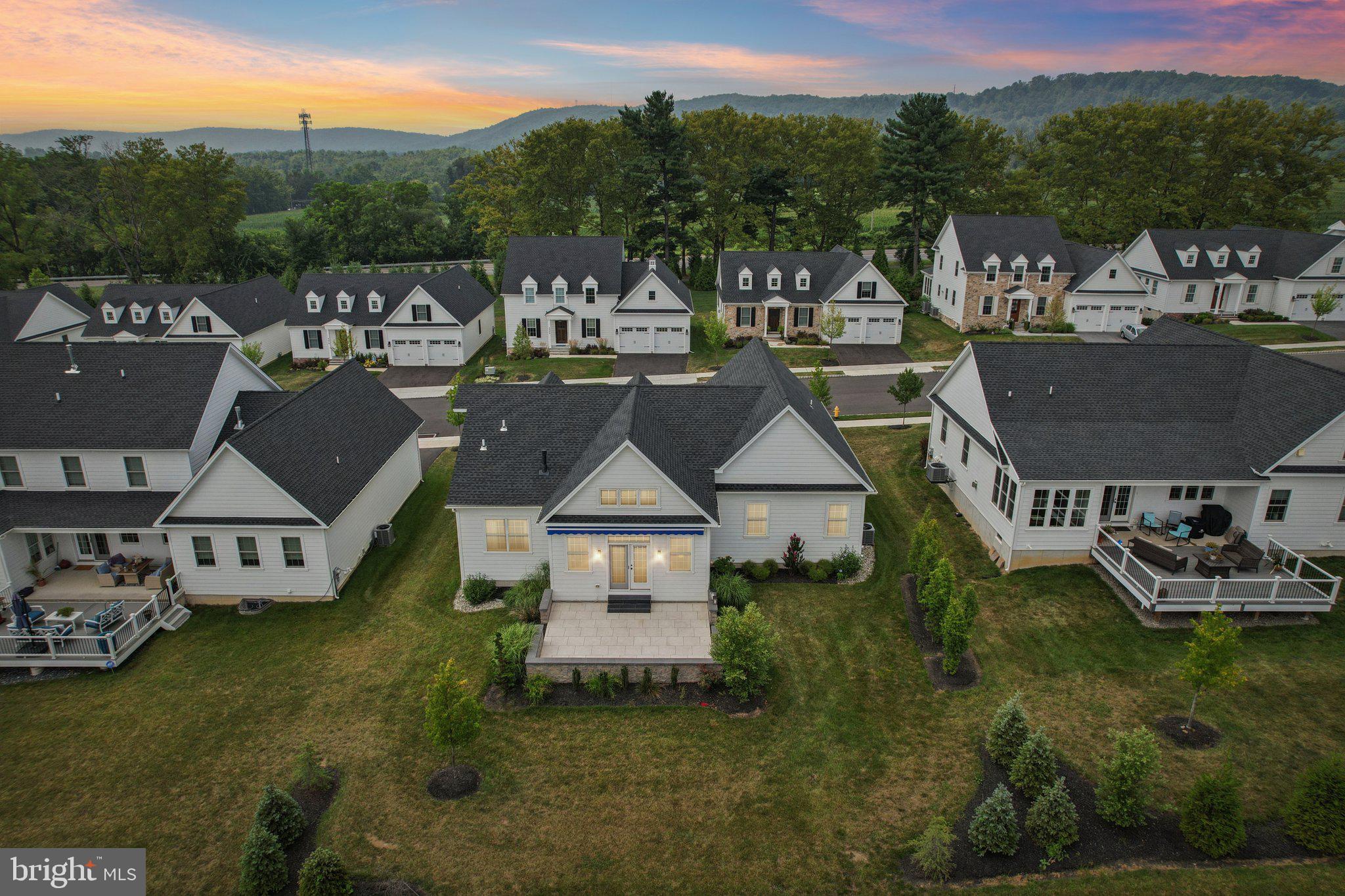 4459 Old Saucon Road Bethlehem, PA 18015 - Photo 29 of 40 a aerial view of a house with swimming pool and a yard