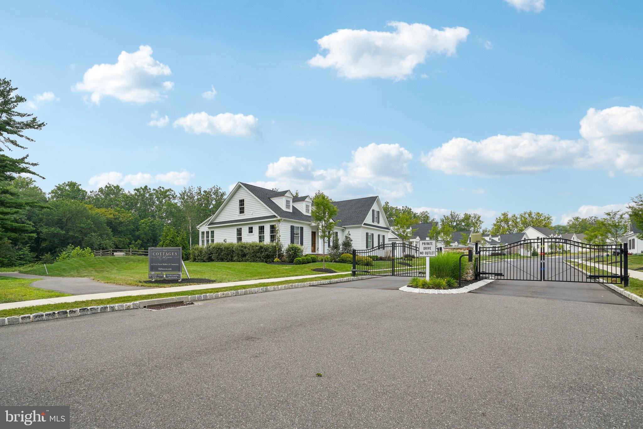 4459 Old Saucon Road Bethlehem, PA 18015 - Photo 35 of 40 a view of a house with a big yard and a large tree