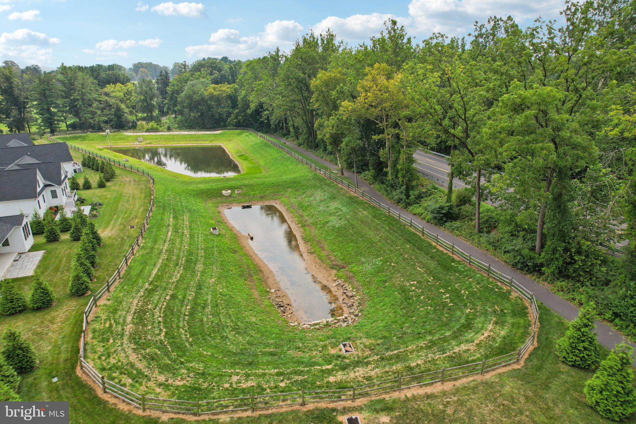 4459 Old Saucon Road Bethlehem, PA 18015 - Photo 39 of 40 a view of a swimming pool with a yard