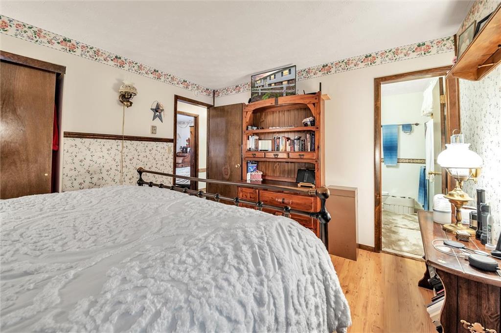 10 Rayne Church Road Indiana, PA 15701 - Photo 13 of 25 a bedroom with bed and a large mirror