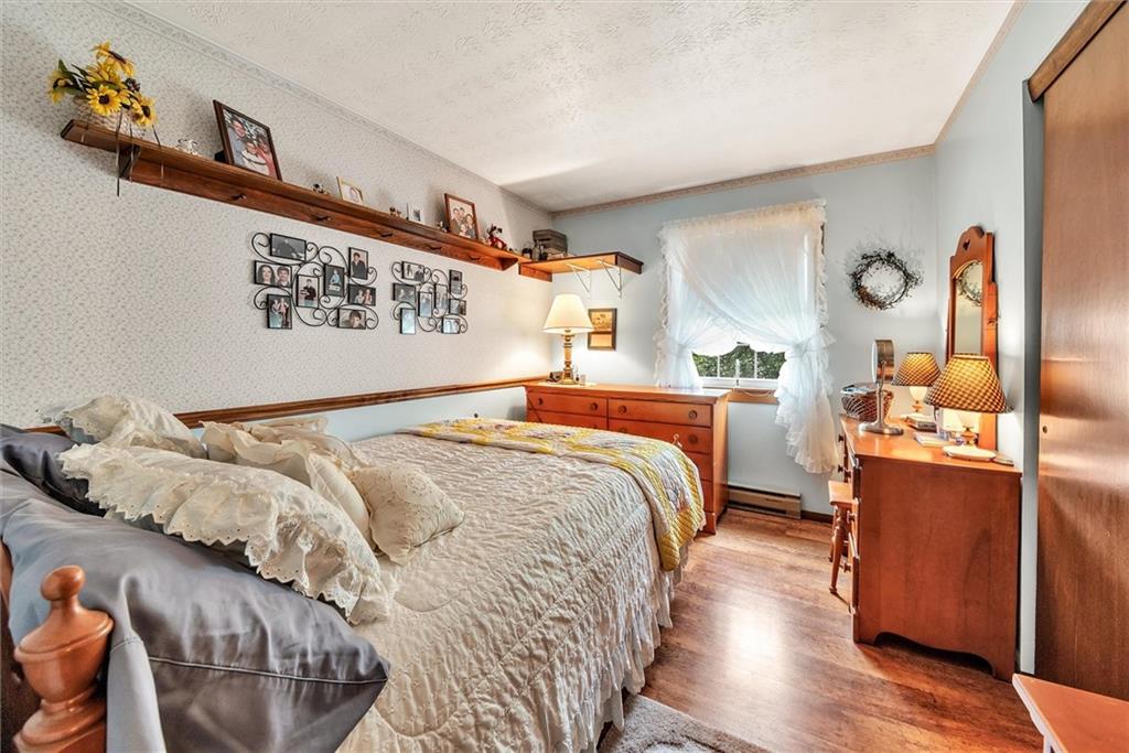10 Rayne Church Road Indiana, PA 15701 - Photo 14 of 25 a bedroom with a bed and wooden floor