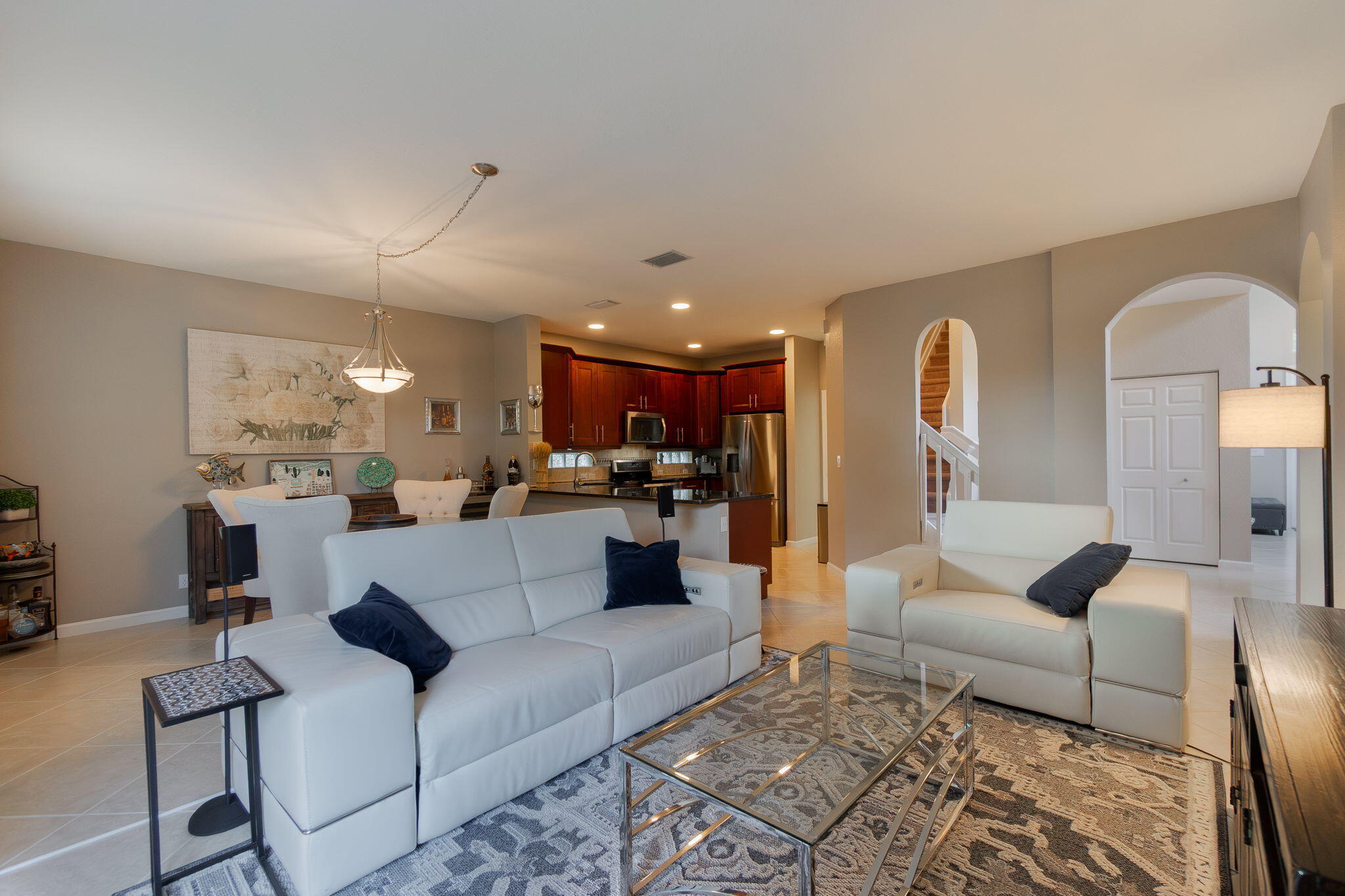 1004 Center Stone Lane Riviera Beach, FL 33404 - Photo 14 of 47 a living room with furniture and kitchen view
