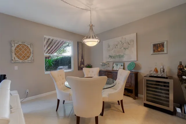 a kitchen with stainless steel appliances granite countertop a refrigerator stove microwave and sink