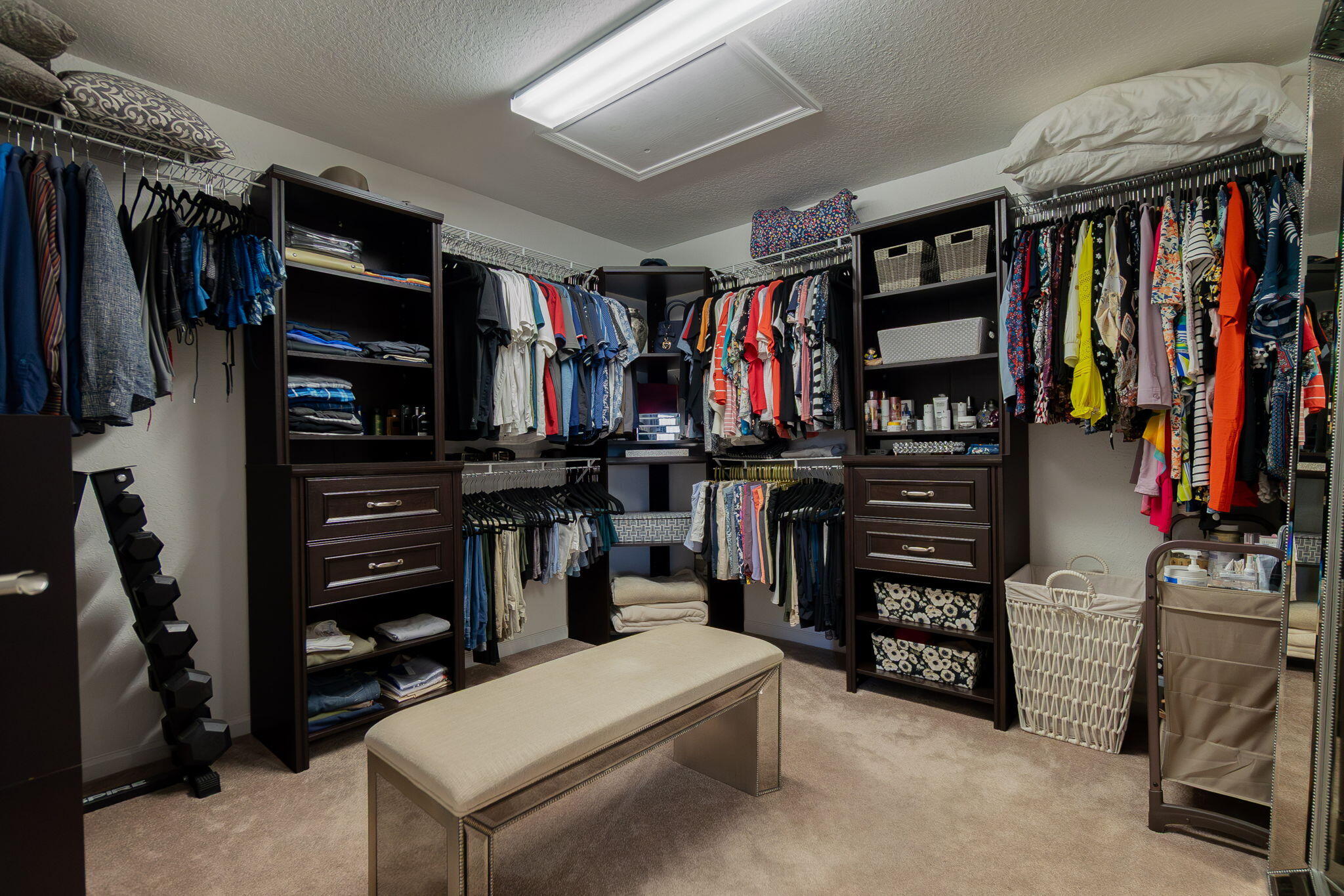 1004 Center Stone Lane Riviera Beach, FL 33404 - Photo 25 of 47 a view of walk in closet with clothes and shoes