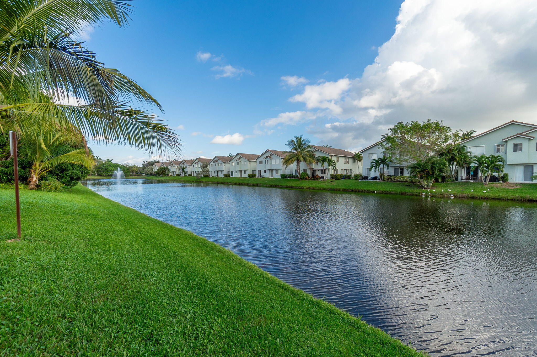 1004 Center Stone Lane Riviera Beach, FL 33404 - Photo 47 of 47 a view of a lake with a yard