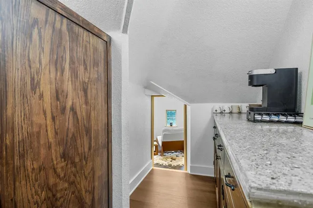 a view of a living room with furniture