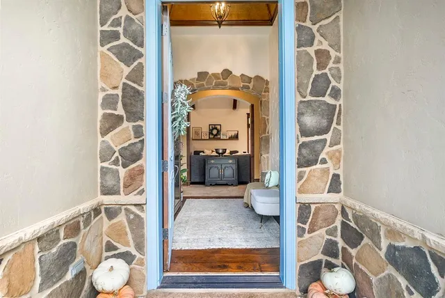 a bathroom with a tub and shower