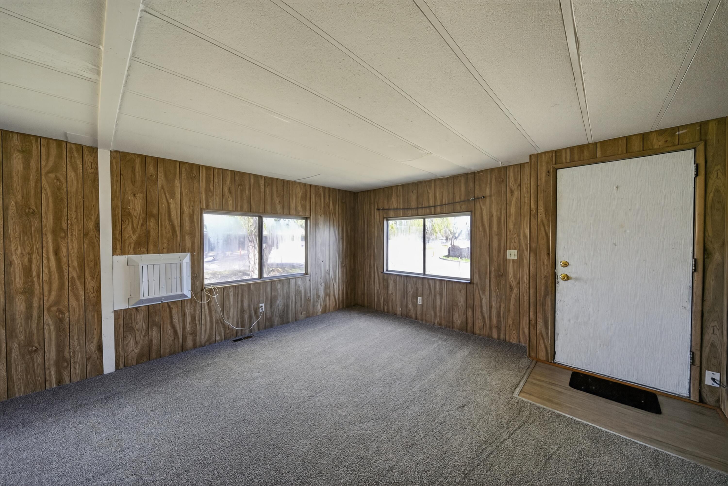 21133 Ronald Street Anderson, CA 96007 - Photo 11 of 26 an empty room with windows