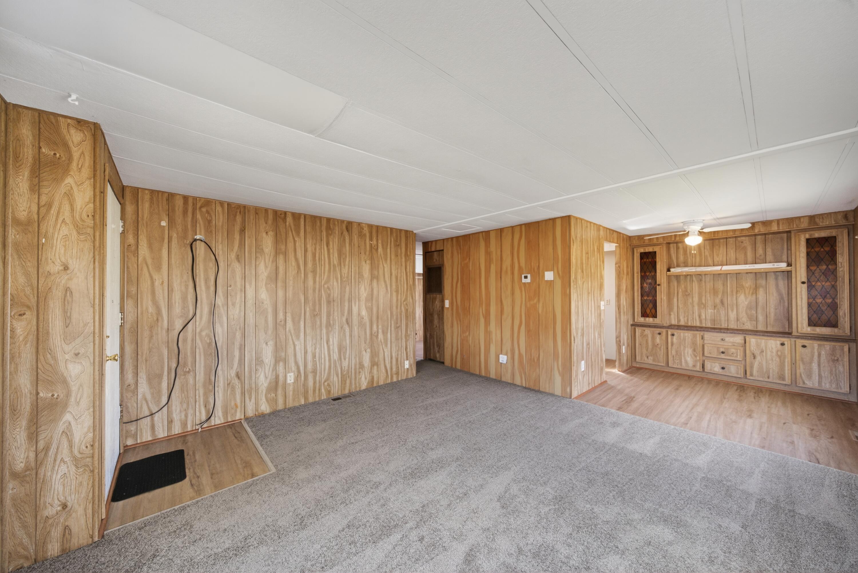 21133 Ronald Street Anderson, CA 96007 - Photo 12 of 26 a view of an empty room with a window