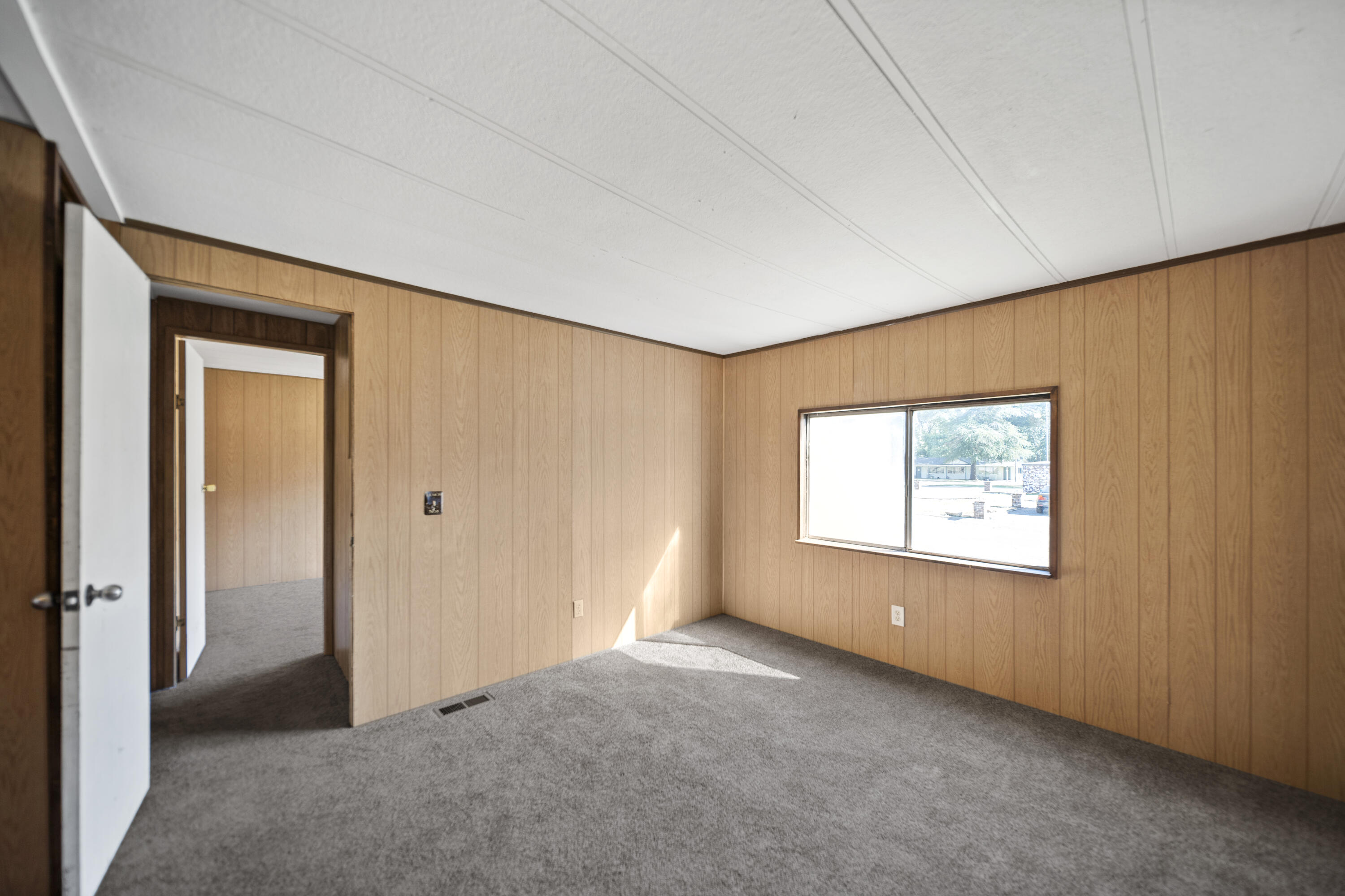 21133 Ronald Street Anderson, CA 96007 - Photo 14 of 26 an empty room with windows