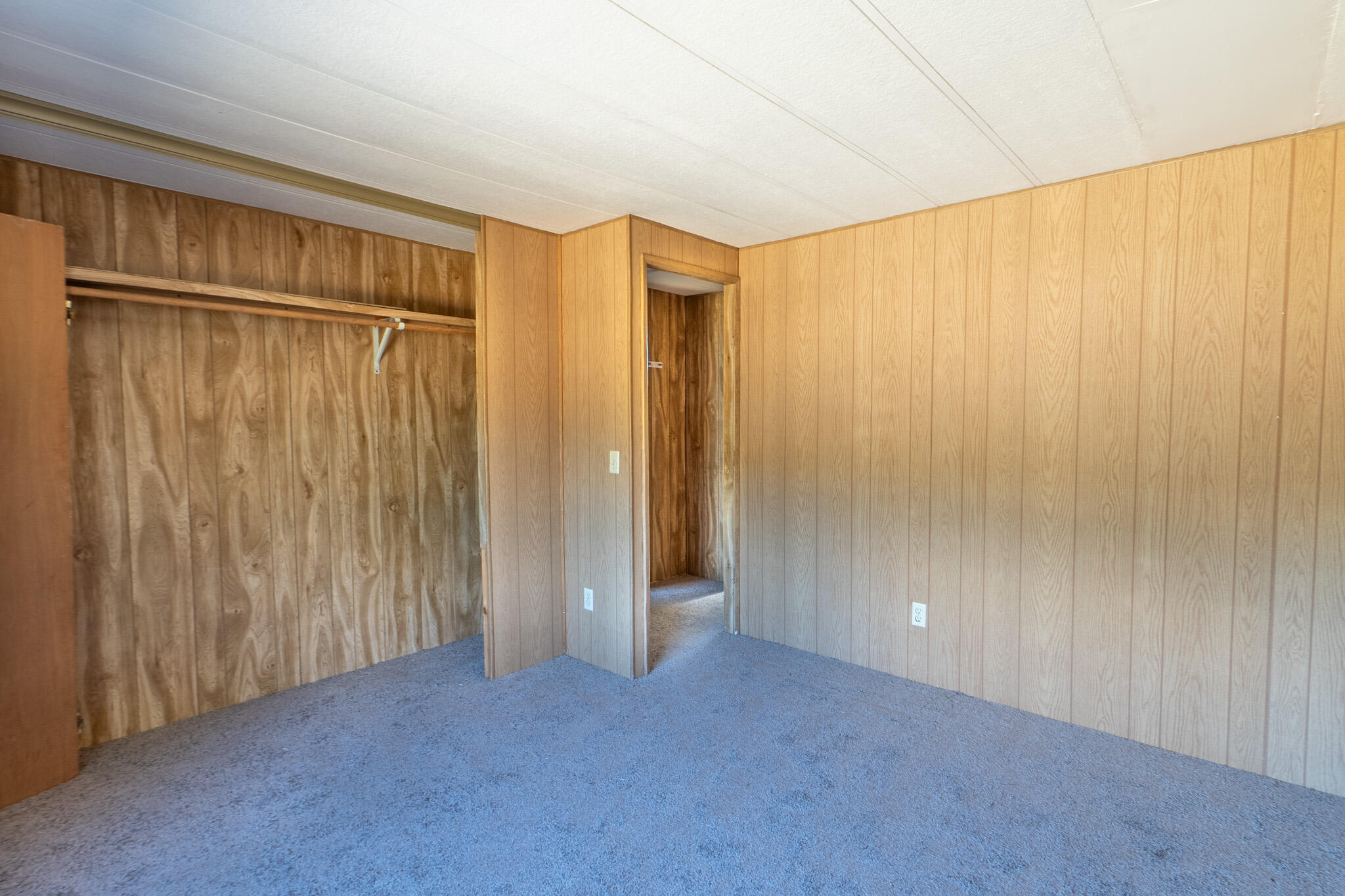 21133 Ronald Street Anderson, CA 96007 - Photo 16 of 26 a view of an empty room with a window