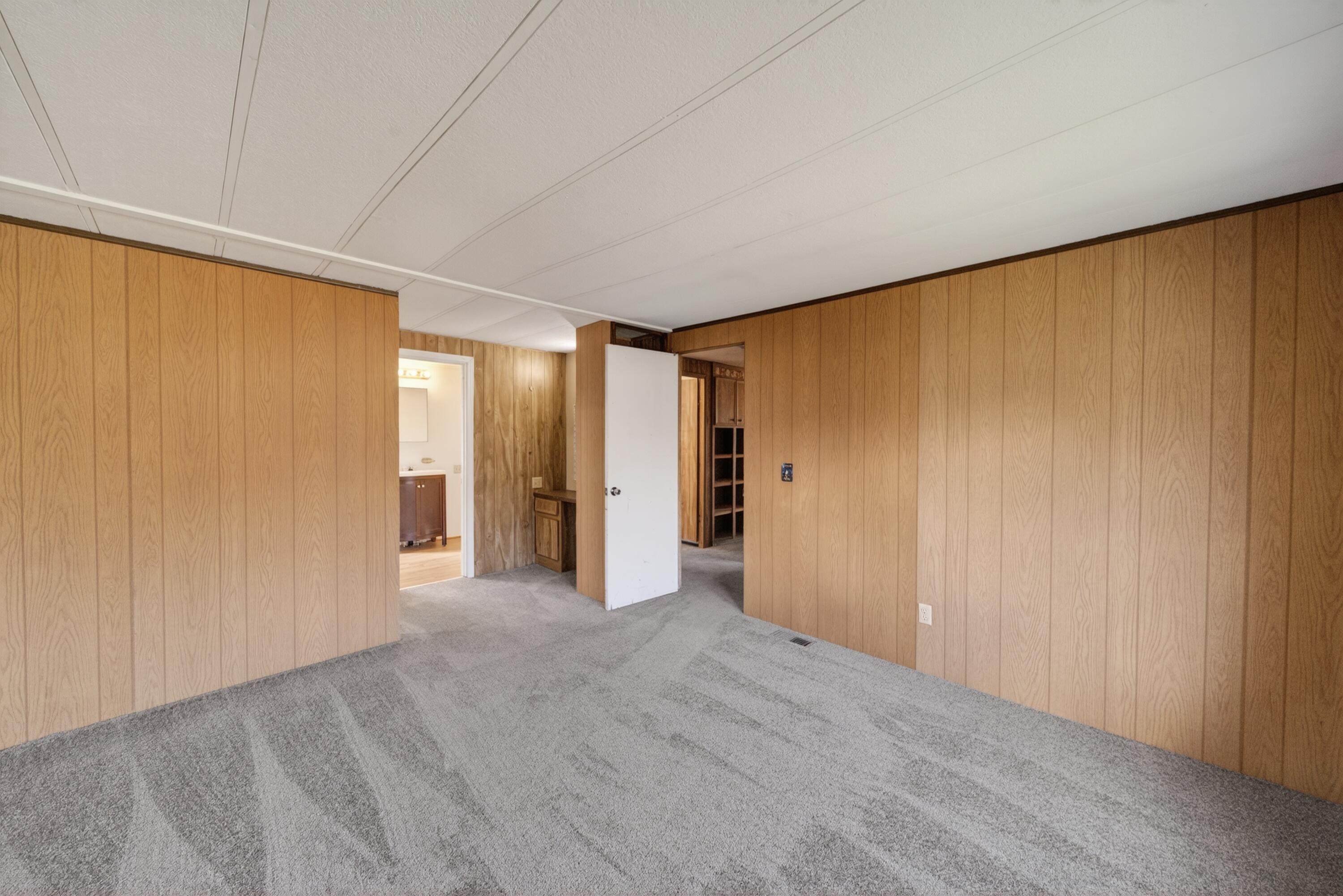 21133 Ronald Street Anderson, CA 96007 - Photo 17 of 26 a view of empty room with wooden floor